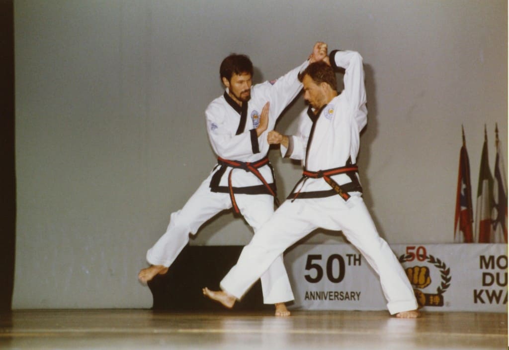 Frank Schermerhorn Sa Bom Nim and Williams Johns Sa Bom Nim demonstrating at the Moo Duk Kwan 50th Anniversary in Korea